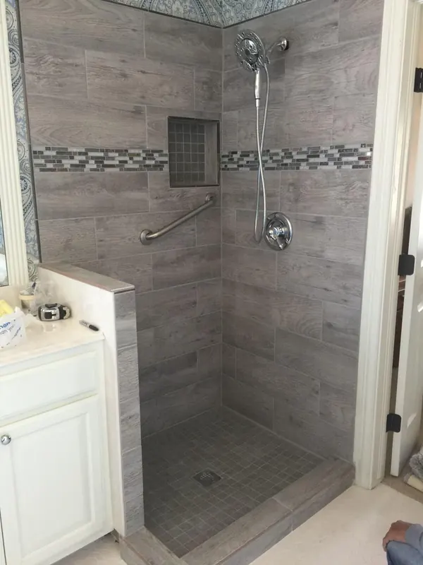Tiled walk-in shower by Hanlon Construction
