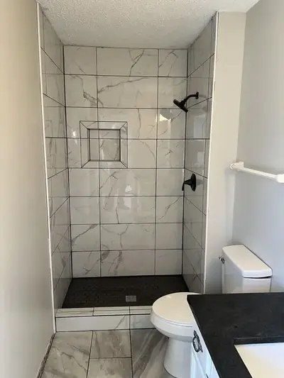 Bathroom and tile remodel project by Hanlon Construction